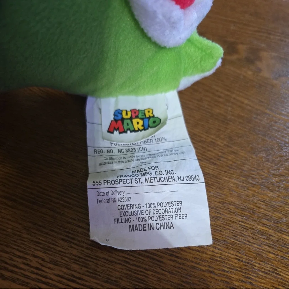 youshi mario brothers plush with pouch under his shell collectiors‎